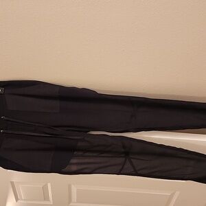 Classic DKNY black silk, sheer pants with built-in shorts and back pockets